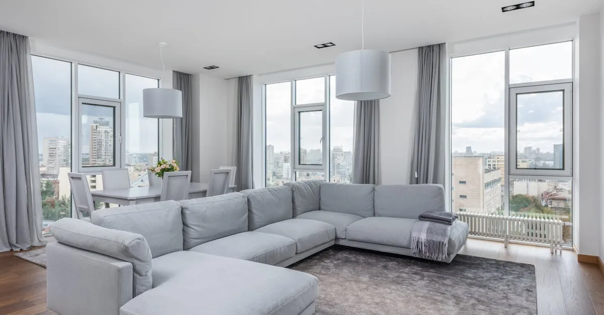 Cozy, clean living room with large windows